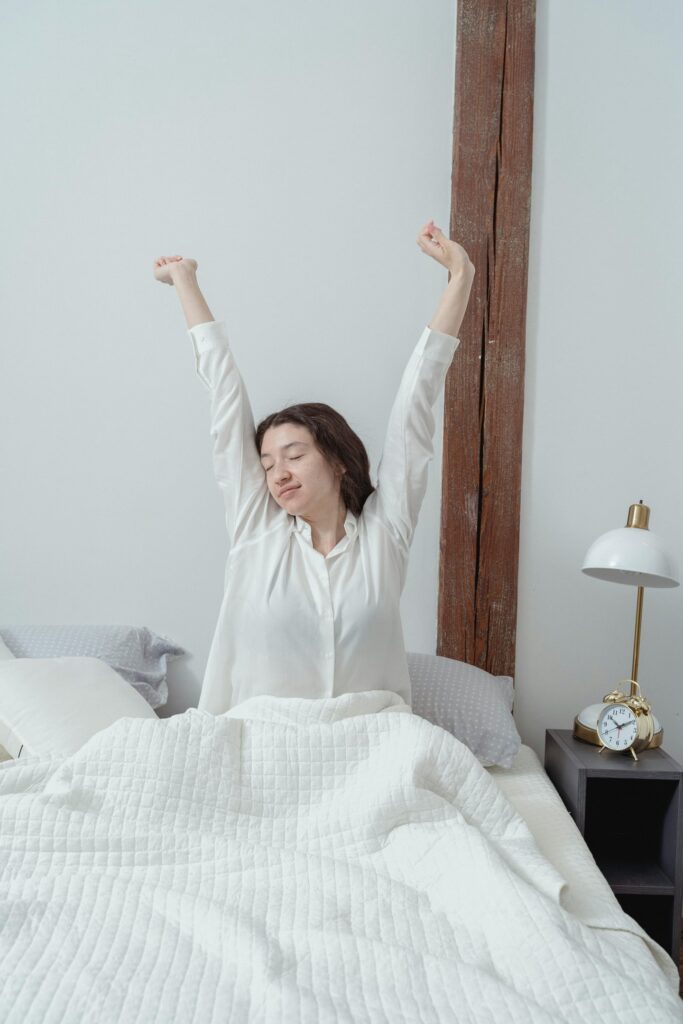 a woman waking up after a quality sleep