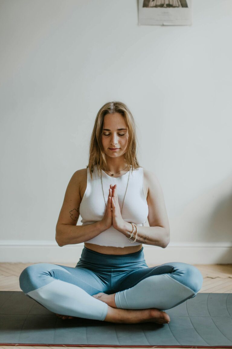 Beyond the Mat: What Yoga Really Is and Why It Matters? 1 a woman practicing yoga