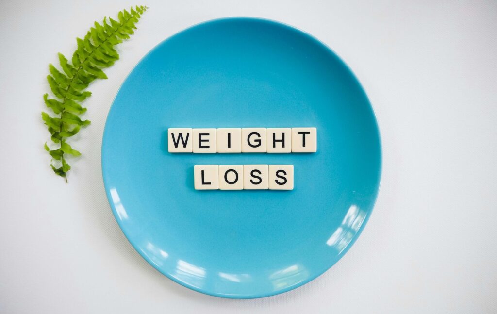 written weight loss in a blue plate